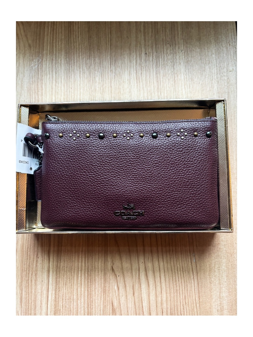COACH Authentic Pebbled Leather Wristlet in Burgundy with Stud Accents
